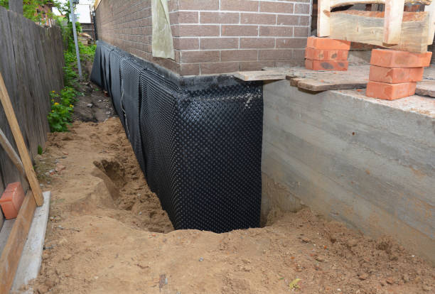 Happy homeowners after waterproofing job in Merrillville
